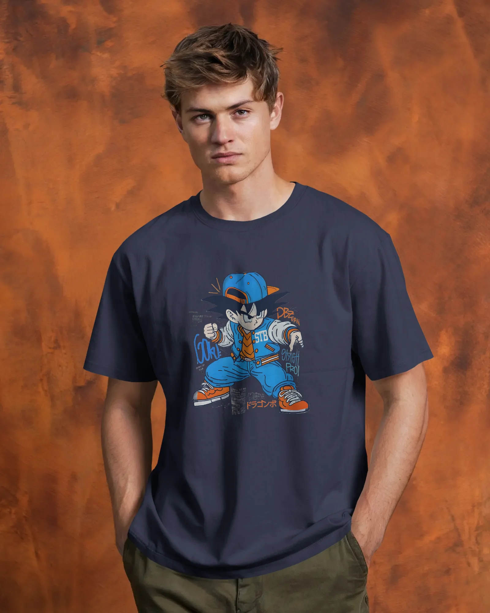 tshirt-mockup-male-model-front-view-hands-in-pockets-against-textured-orange-backdrop-confident-and-casual-pose-01776 (4) Little Goku 2 - Image 1